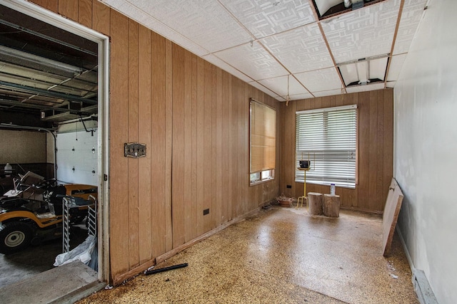 2597 E Glendora Rd, Buchanan, MI 49107 - garage with wood walls