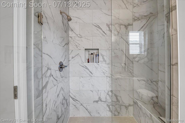 21150 Bryce Ct, Romulus, MI 48174 - bathroom featuring a marble finish shower