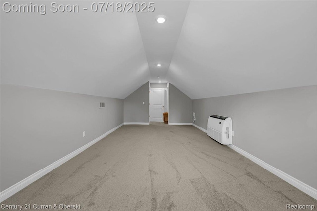 21150 Bryce Ct, Romulus, MI 48174 - bonus room with lofted ceiling, carpet flooring, and recessed lighting