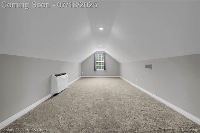 21150 Bryce Ct, Romulus, MI 48174 - additional living space featuring vaulted ceiling, carpet, and recessed lighting