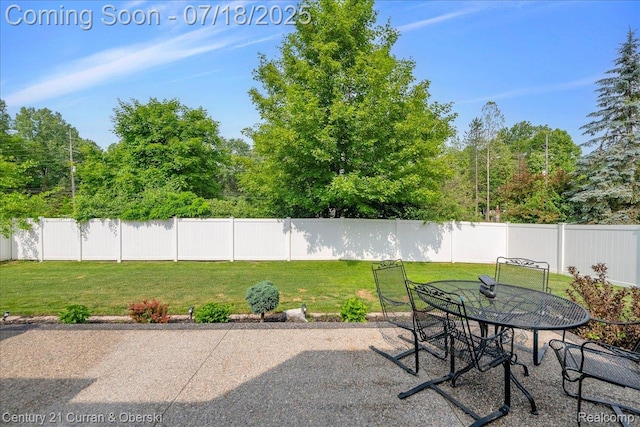 21150 Bryce Ct, Romulus, MI 48174 - view of yard with a patio and outdoor dining area