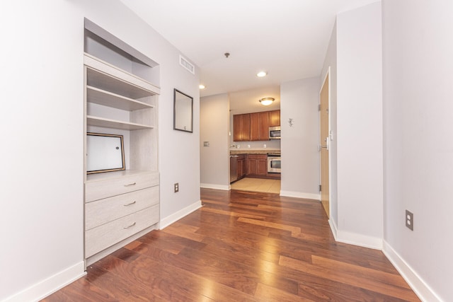 111 N Ashley St Unit 412, Ann Arbor, MI 48104 - corridor with wood finished floors and recessed lighting