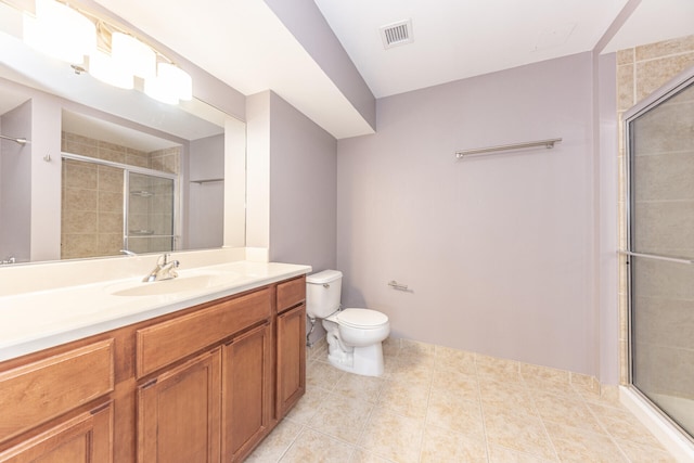 111 N Ashley St Unit 412, Ann Arbor, MI 48104 - bathroom featuring a shower stall, vanity, and tile patterned floors
