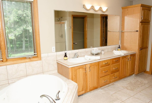11734 Lindy Ct, Rockford, MI 49341 - full bath with a tub with jets, double vanity, tile patterned flooring, and a shower