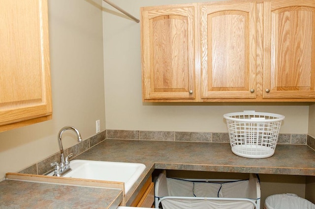11734 Lindy Ct, Rockford, MI 49341 - kitchen featuring light brown cabinetry and dark countertops