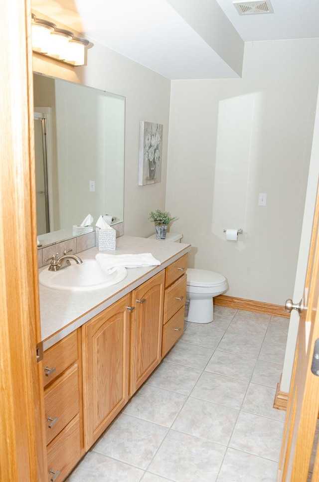 11734 Lindy Ct, Rockford, MI 49341 - bathroom with vanity and tile patterned flooring