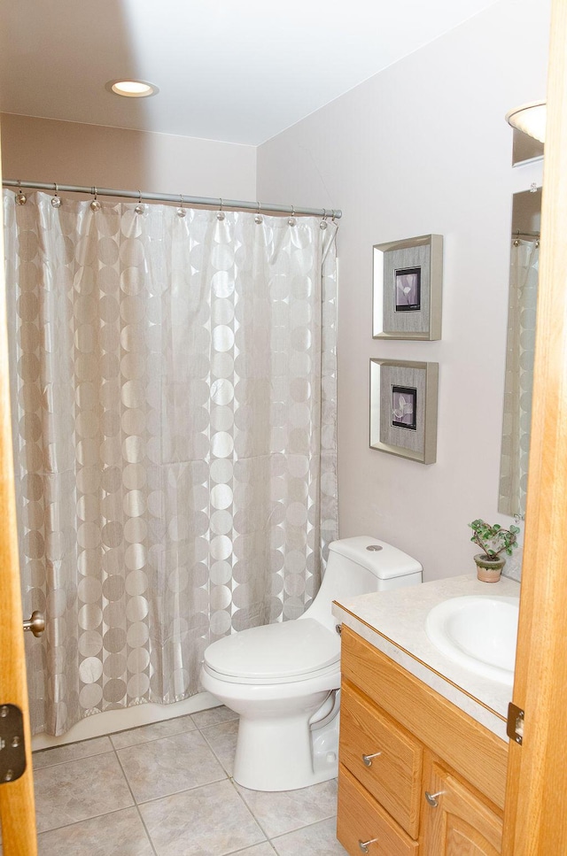 11734 Lindy Ct, Rockford, MI 49341 - full bath featuring vanity and tile patterned flooring