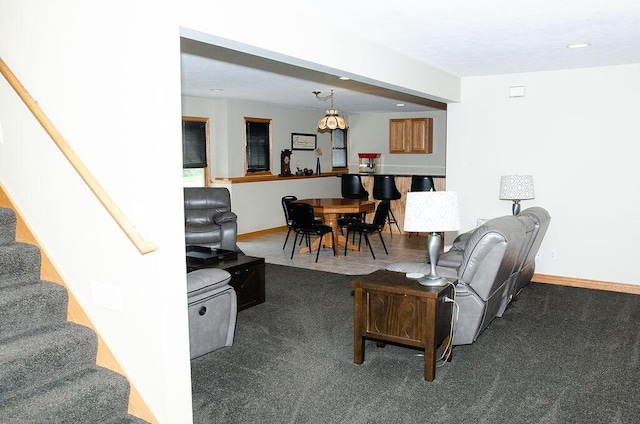 11734 Lindy Ct, Rockford, MI 49341 - carpeted living area featuring stairs and recessed lighting
