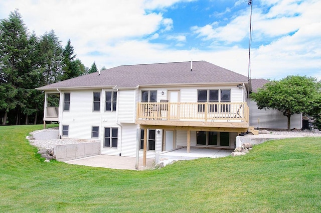 11734 Lindy Ct, Rockford, MI 49341 - back of house with a patio area, a lawn, and a wooden deck