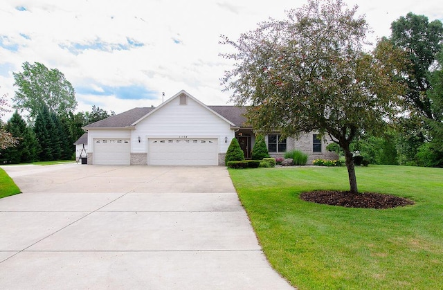 11734 Lindy Ct, Rockford, MI 49341 - ranch-style home with a garage, driveway, a front yard, and brick siding