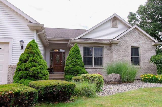 11734 Lindy Ct, Rockford, MI 49341 - view of front of property featuring roof with shingles