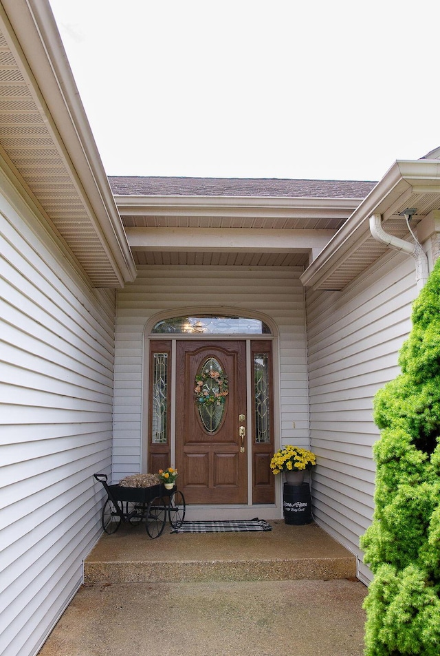 11734 Lindy Ct, Rockford, MI 49341 - entrance to property featuring a shingled roof