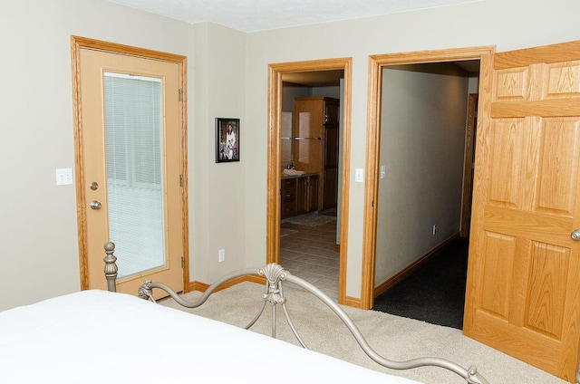 11734 Lindy Ct, Rockford, MI 49341 - bedroom featuring carpet flooring and connected bathroom
