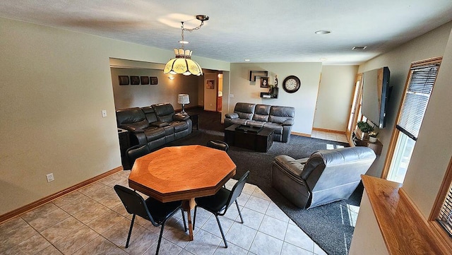 11734 Lindy Ct, Rockford, MI 49341 - living room with baseboards and light tile patterned floors