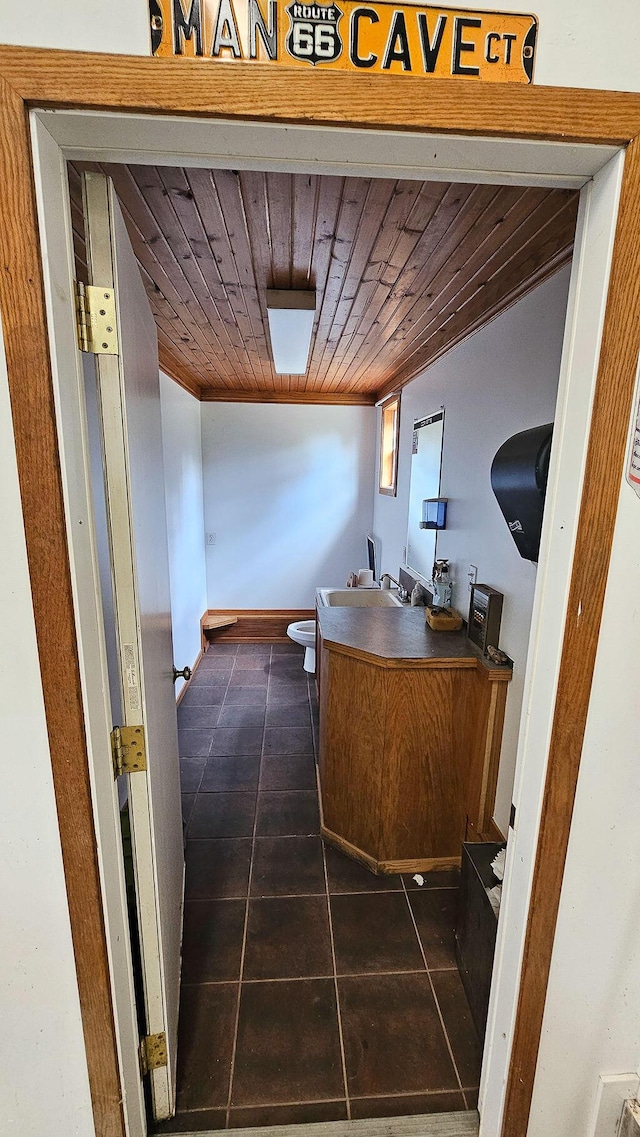 11734 Lindy Ct, Rockford, MI 49341 - office featuring dark tile patterned flooring and wood ceiling