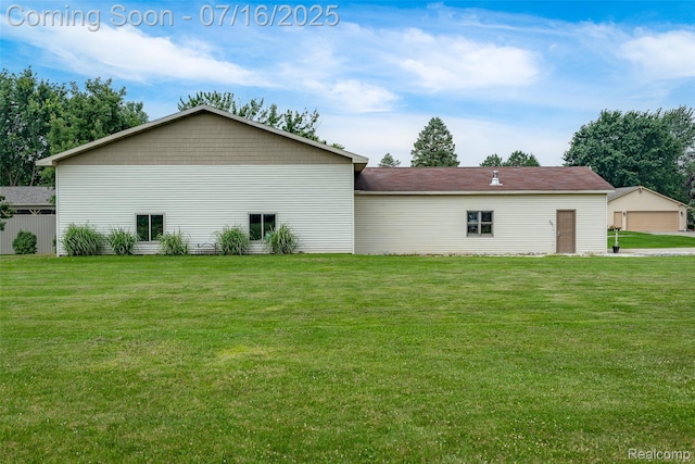 7366 E Maple Ave, Grand Blanc, MI 48439 - view of property exterior featuring a yard