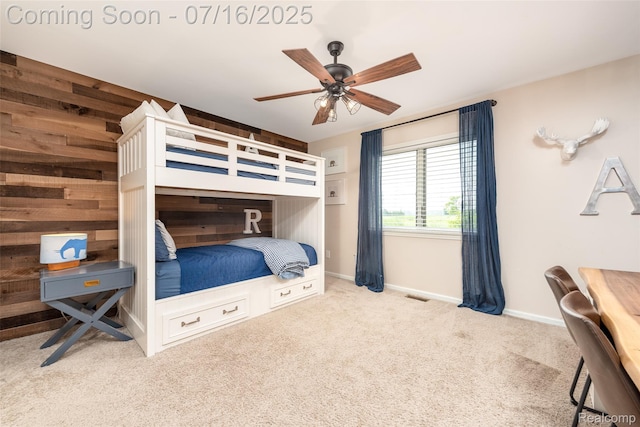 7366 E Maple Ave, Grand Blanc, MI 48439 - bedroom with carpet, wood walls, and ceiling fan