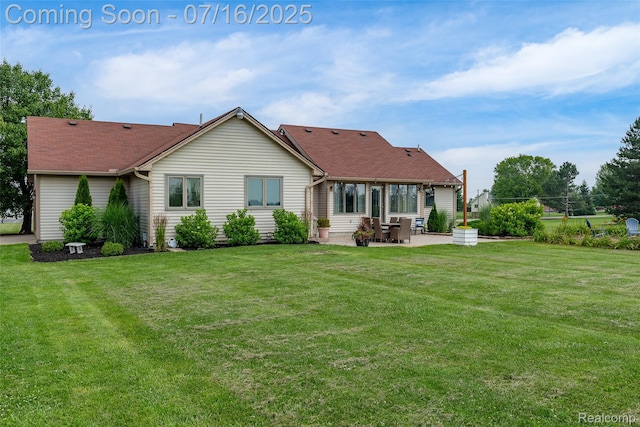 7366 E Maple Ave, Grand Blanc, MI 48439 - back of house with a patio, a yard, and roof with shingles