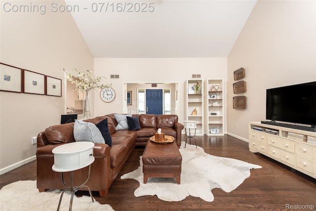 7366 E Maple Ave, Grand Blanc, MI 48439 - living area featuring high vaulted ceiling and wood finished floors