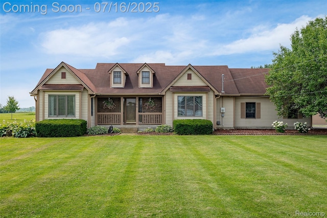 7366 E Maple Ave, Grand Blanc, MI 48439 - new england style home featuring a front lawn