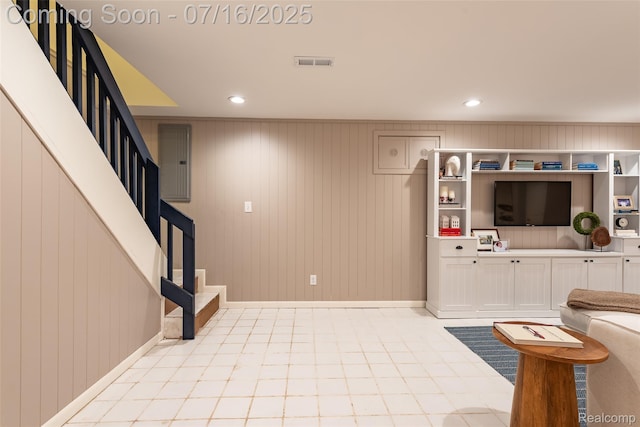 7366 E Maple Ave, Grand Blanc, MI 48439 - living area with stairway, recessed lighting, and electric panel
