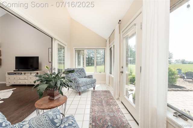 7366 E Maple Ave, Grand Blanc, MI 48439 - sunroom with baseboards and high vaulted ceiling