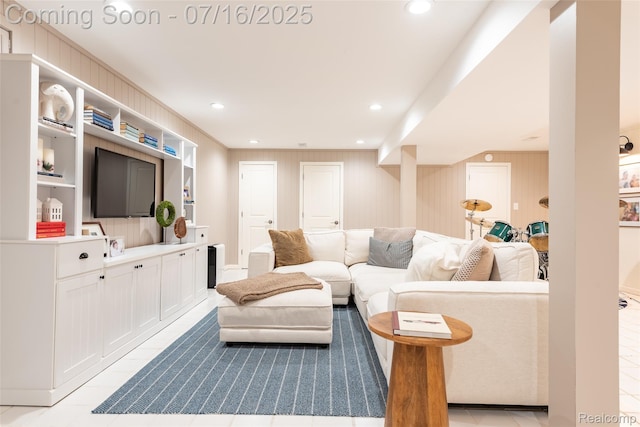 7366 E Maple Ave, Grand Blanc, MI 48439 - living room featuring recessed lighting, wood walls, and light tile patterned floors