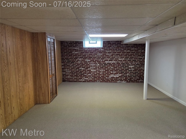 4507 Sedgemoor Ave, Royal Oak, MI 48073 - finished basement featuring carpet floors, a drop ceiling, brick wall, and wood walls