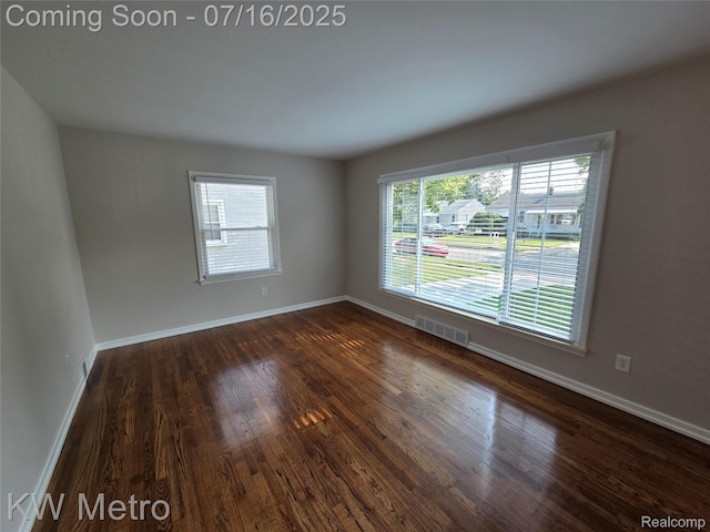 4507 Sedgemoor Ave, Royal Oak, MI 48073 - empty room featuring dark wood-type flooring and baseboards