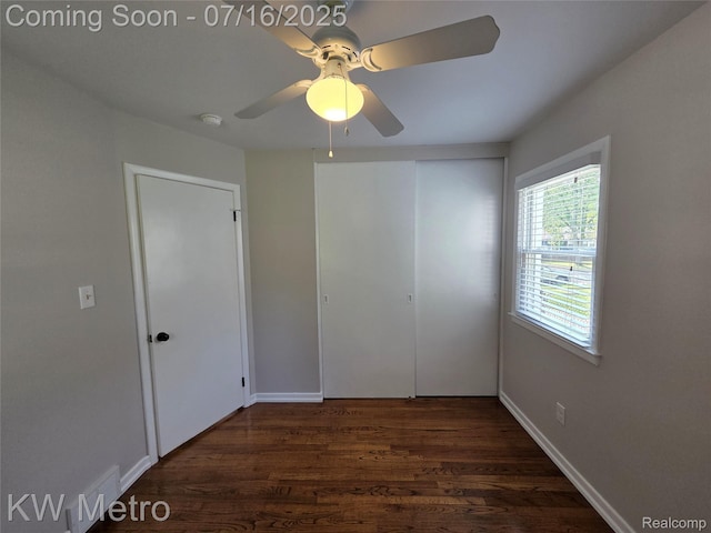 4507 Sedgemoor Ave, Royal Oak, MI 48073 - unfurnished bedroom featuring dark wood-style flooring, ceiling fan, and a closet