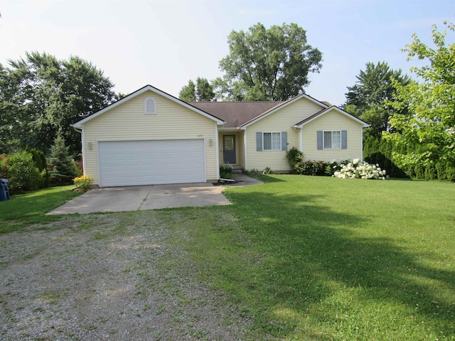 4237 W Grand Blanc Rd, Swartz Creek, MI 48473 - single story home with an attached garage, driveway, and a front lawn