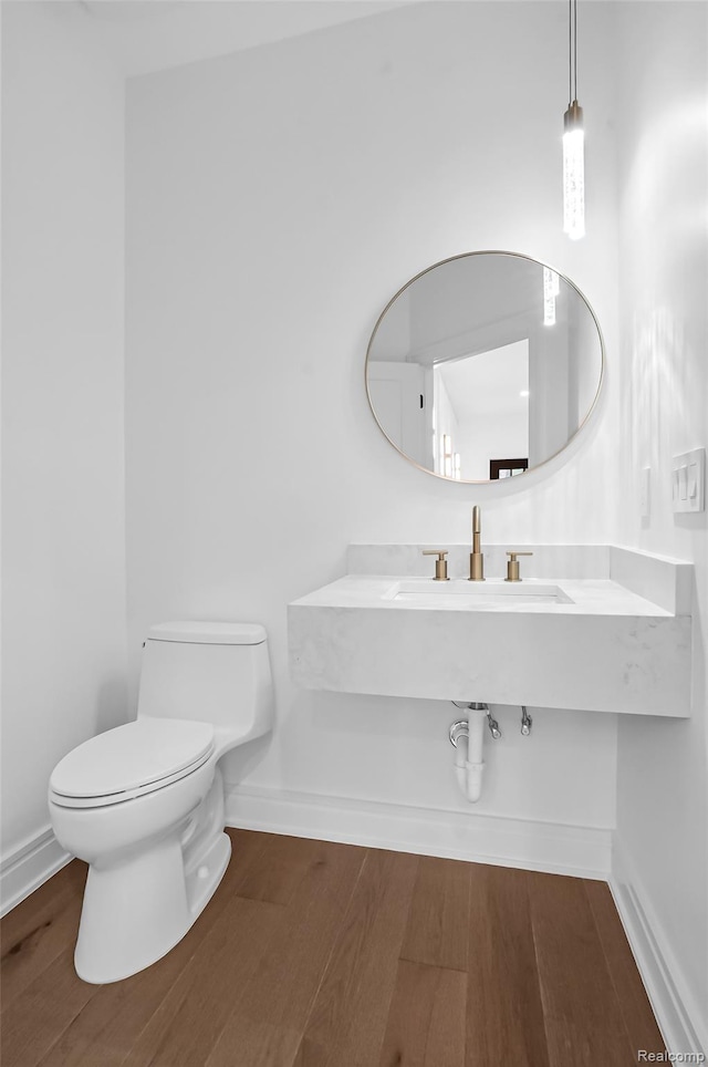 227 W Houstonia Ave, Royal Oak, MI 48073 - bathroom featuring toilet and wood finished floors