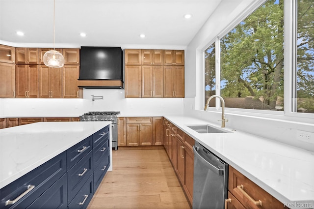 227 W Houstonia Ave, Royal Oak, MI 48073 - kitchen with appliances with stainless steel finishes, exhaust hood, light wood finished floors, recessed lighting, and glass insert cabinets
