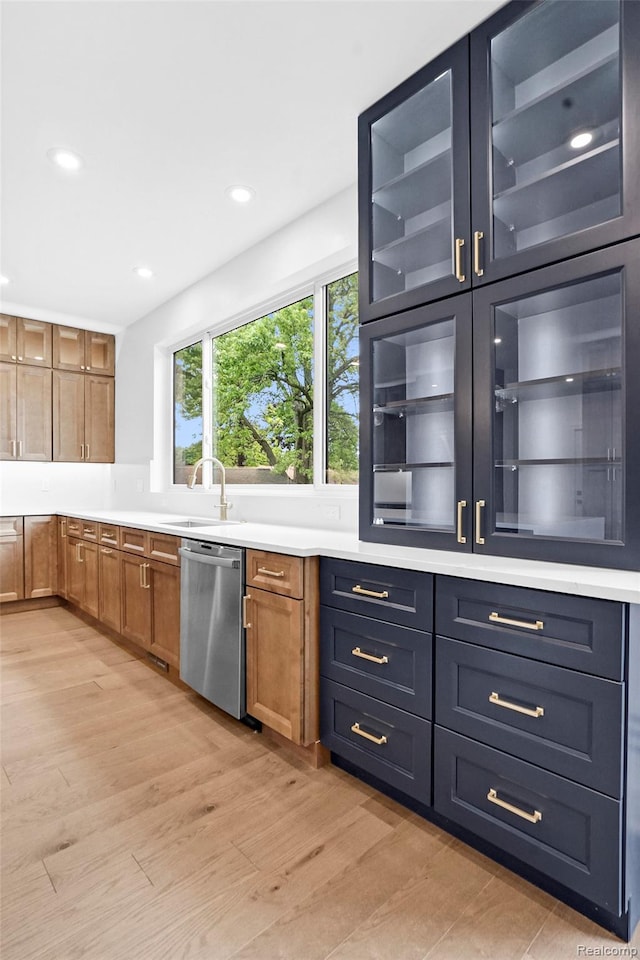 227 W Houstonia Ave, Royal Oak, MI 48073 - kitchen with stainless steel dishwasher, light wood finished floors, glass insert cabinets, and recessed lighting