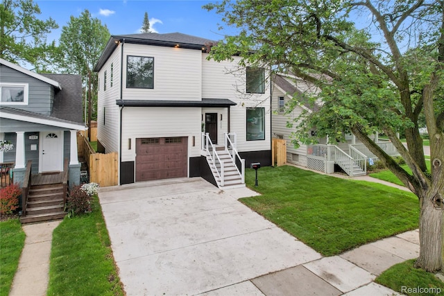 227 W Houstonia Ave, Royal Oak, MI 48073 - view of front of home with a garage and concrete driveway