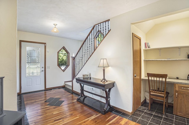 220 Park Ave, South Haven, MI 49090 - entrance foyer featuring dark wood-type flooring and stairway