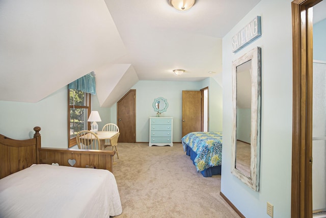 220 Park Ave, South Haven, MI 49090 - bedroom featuring carpet flooring and vaulted ceiling