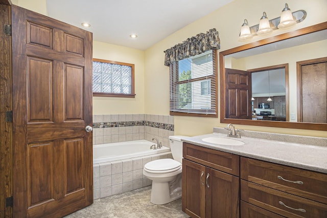 220 Park Ave, South Haven, MI 49090 - bathroom with a bath, vanity, tile patterned floors, and recessed lighting