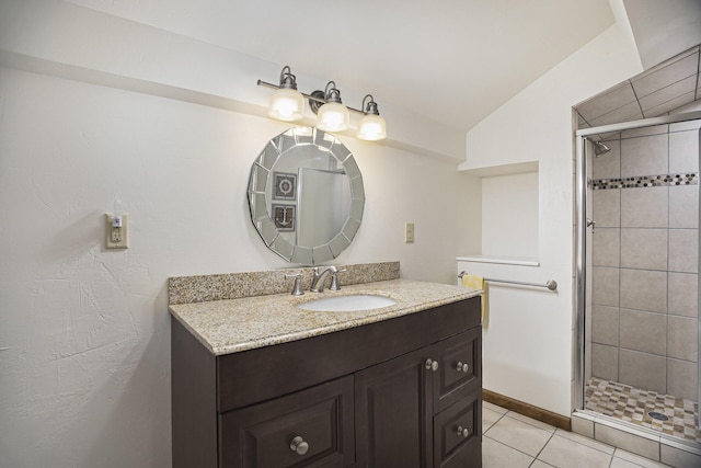 220 Park Ave, South Haven, MI 49090 - bathroom with a stall shower, vanity, tile patterned flooring, and lofted ceiling