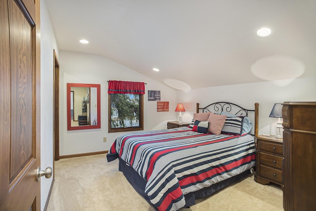 220 Park Ave, South Haven, MI 49090 - bedroom featuring light colored carpet, vaulted ceiling, and recessed lighting