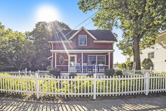 220 Park Ave, South Haven, MI 49090 - view of front of property with a porch and a fenced front yard