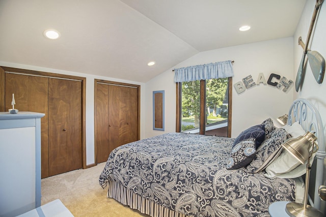 220 Park Ave, South Haven, MI 49090 - bedroom with light colored carpet, multiple closets, lofted ceiling, and recessed lighting