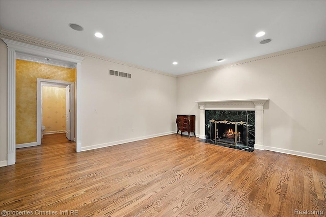 400 Hamilton Rd, Bloomfield, MI 48301 - unfurnished living room with crown molding, a fireplace, wood finished floors, and recessed lighting
