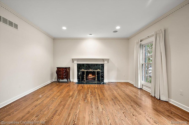 400 Hamilton Rd, Bloomfield, MI 48301 - unfurnished living room with a fireplace, wood finished floors, ornamental molding, and recessed lighting