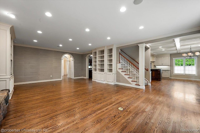400 Hamilton Rd, Bloomfield, MI 48301 - unfurnished living room with crown molding, wood finished floors, stairs, recessed lighting, and decorative columns