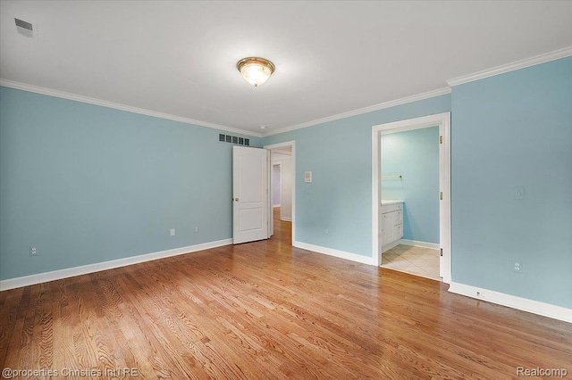 400 Hamilton Rd, Bloomfield, MI 48301 - unfurnished bedroom featuring crown molding, wood finished floors, and connected bathroom