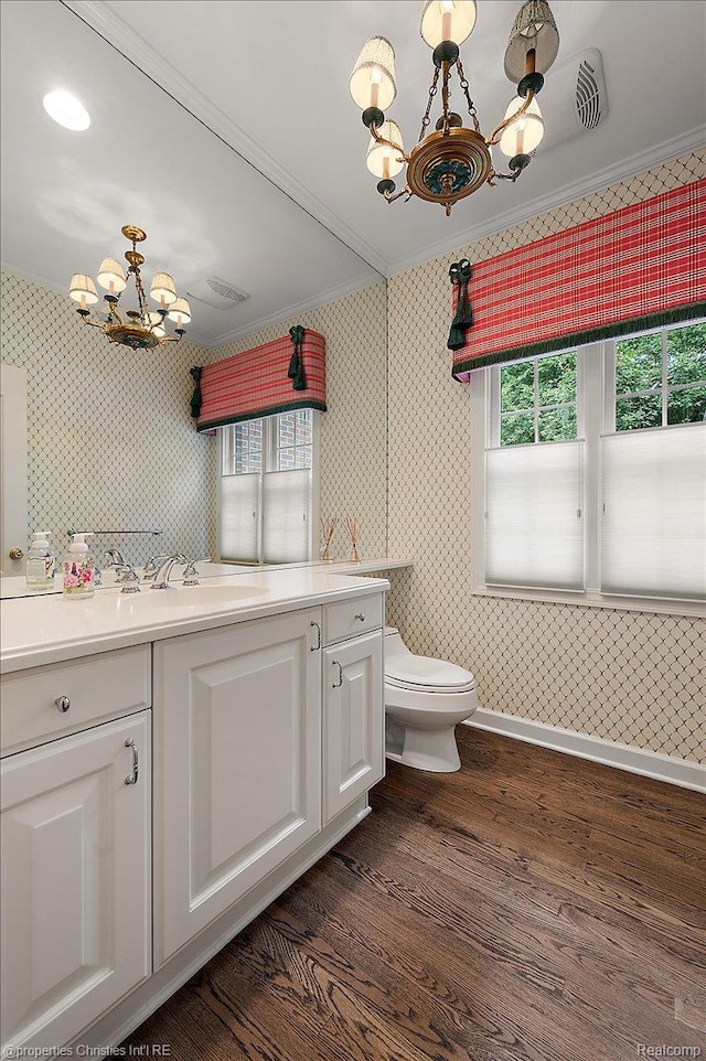 400 Hamilton Rd, Bloomfield, MI 48301 - bathroom featuring a chandelier, wallpapered walls, ornamental molding, vanity, and wood finished floors
