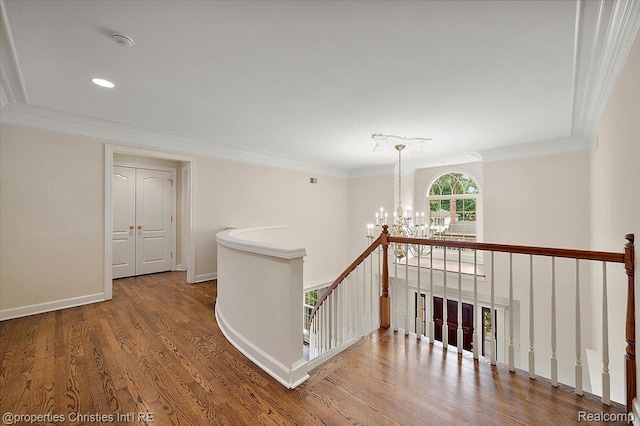 400 Hamilton Rd, Bloomfield, MI 48301 - hall with a chandelier, an upstairs landing, wood finished floors, ornamental molding, and recessed lighting