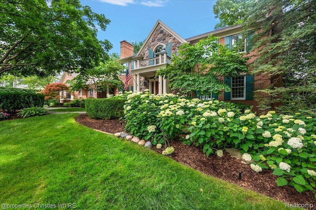 400 Hamilton Rd, Bloomfield, MI 48301 - view of front of property featuring a balcony, a front yard, and a chimney