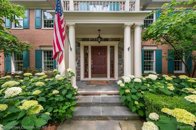 400 Hamilton Rd, Bloomfield, MI 48301 - view of exterior entry with a balcony and brick siding